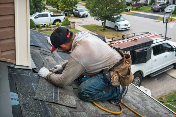 Professional Gutter Installation technician working in Milton, FL